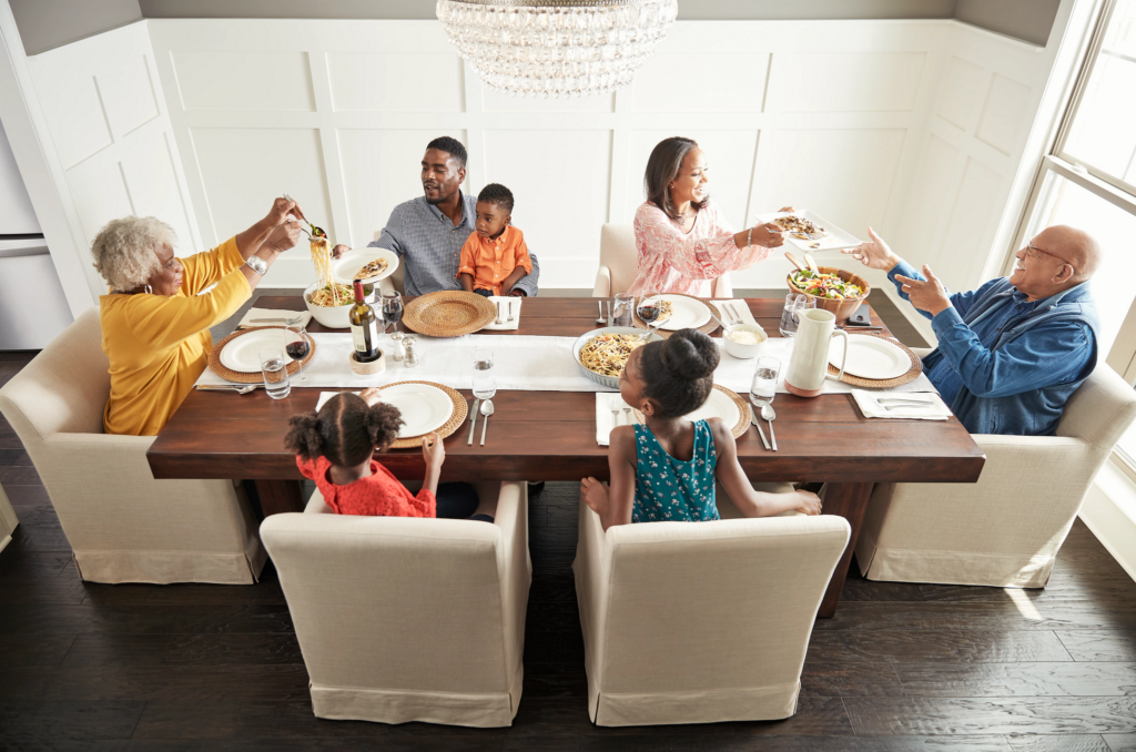 Family having breakfast at the dining table | J/K Carpet Center, Inc